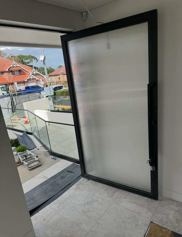 Frameless glass balustrade on a new home entry