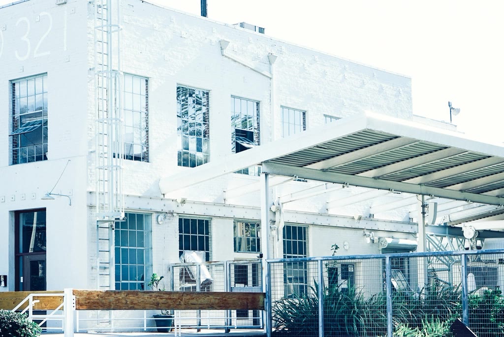 Steel-framed canopy over a building courtyard