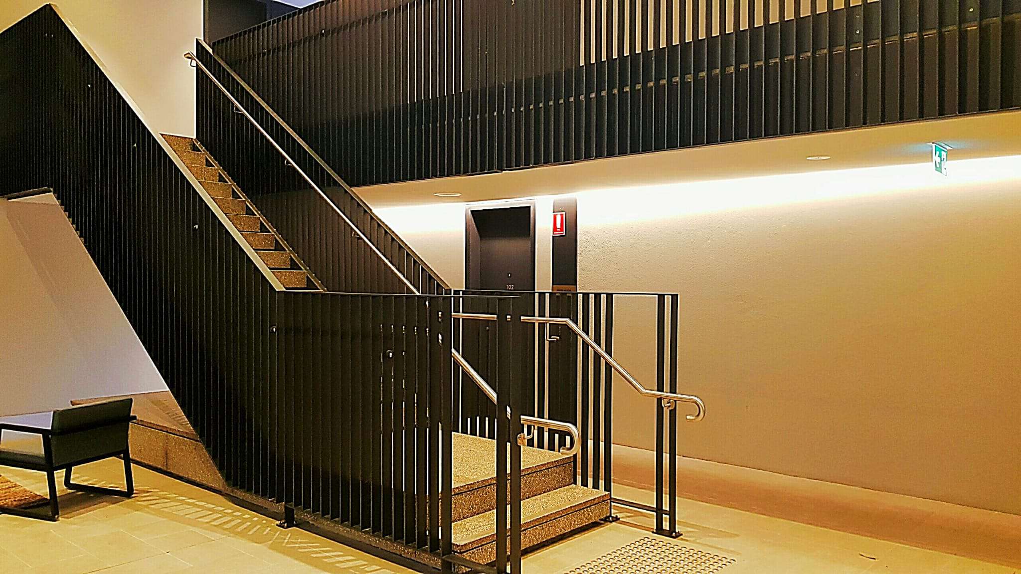 Steel staircase with vertical balustrade