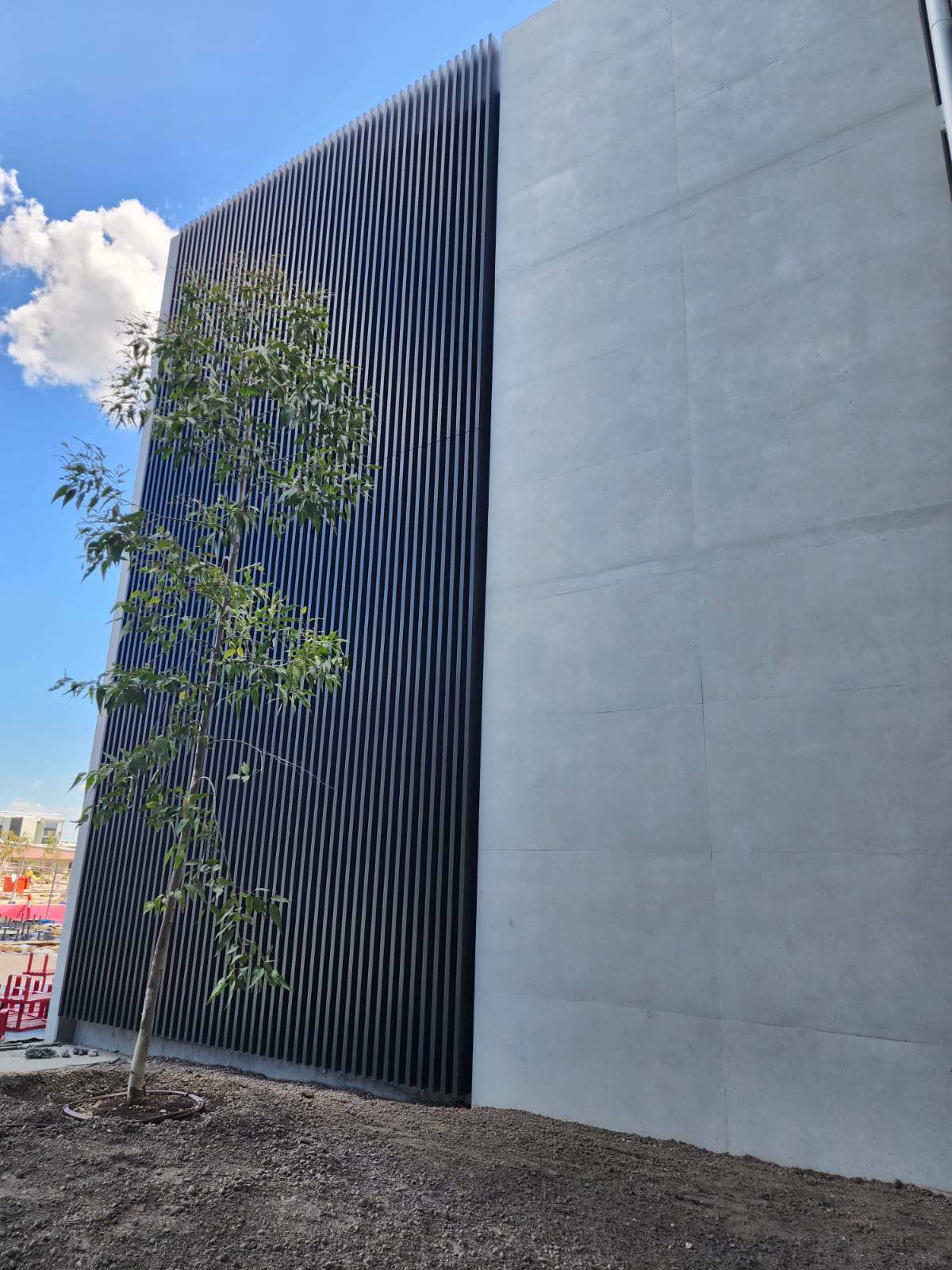Smooth grey rendered wall on a new building